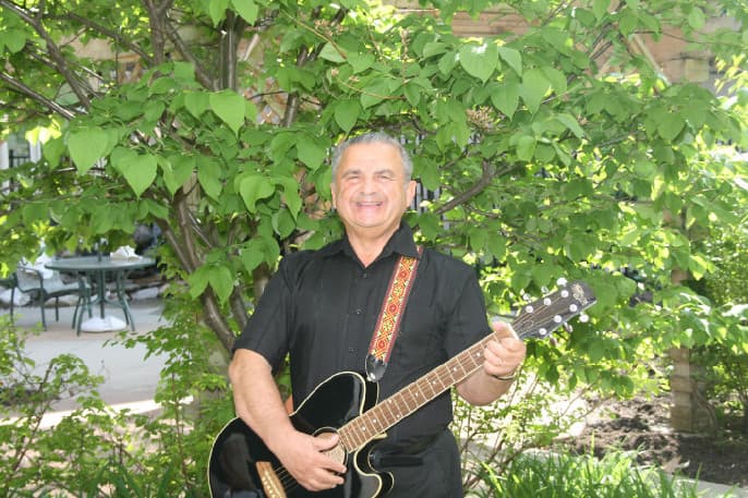 Isaac with his guitar